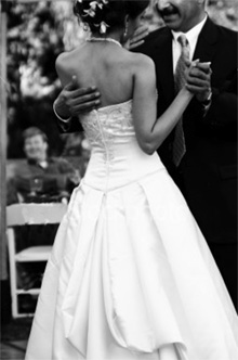A bride and her father sharing a dance